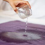 Water poured on waterproof heather grey blanket