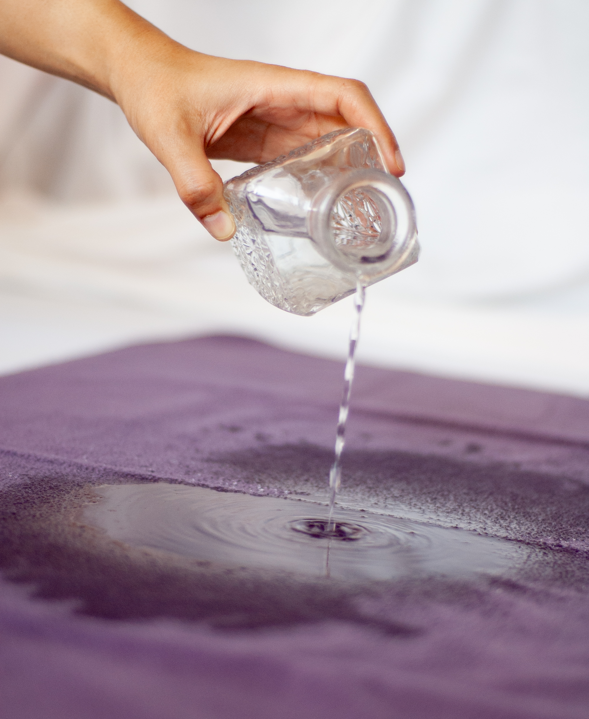 Water poured on waterproof heather grey blanket