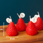 4 Strawberry novelty candles measure 4x3cm