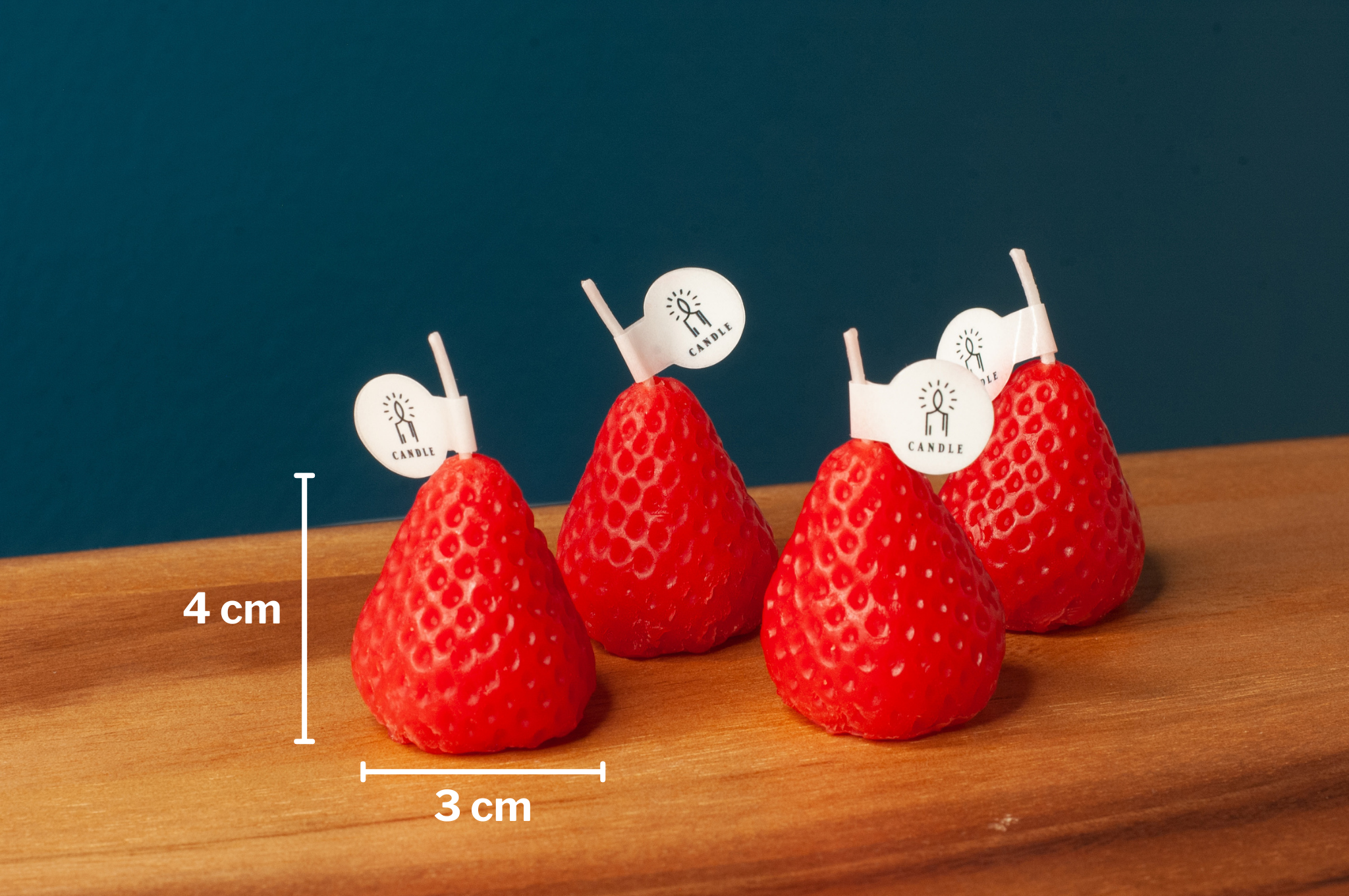 4 Strawberry novelty candles measure 4x3cm