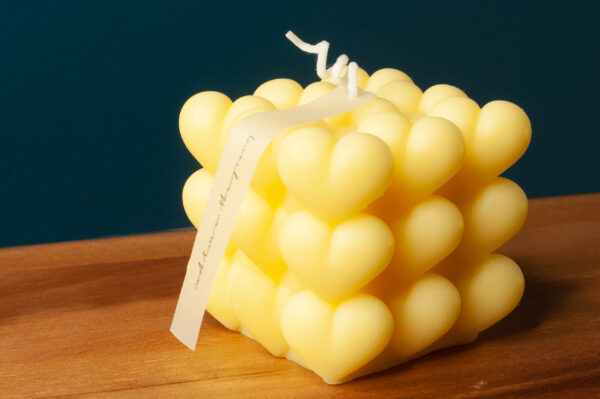 Yellow heart bubble candle