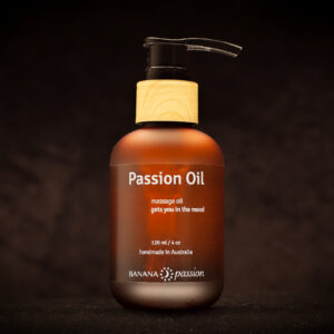 A pump bottle of Passion Massage Oil with bamboo looking cap and reads this massage oil will get you in mood. Made in Australia by Banana Passion brand. It is 120mls of bottle. The passion massage oil is floral and have jasmine, neroli, violet leaf and frankincense as its ingredients