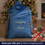 Navy blue velvet Santa sack with 'Naughty or Nice' embroidered detail, drawstring closure, premium festive Christmas gift bag by Banana Passion.