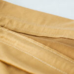 Golden Santa Sack Velvet fabric seem