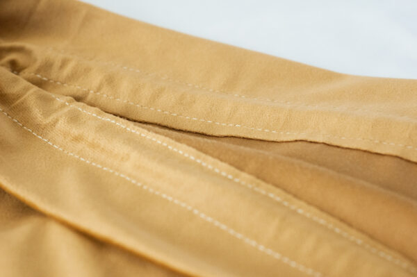 Golden Santa Sack Velvet fabric seem