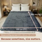 XXL velvety waterproof sex blanket in passion red, extra-large 200 x 200 cm intimacy blanket spread over a bed for full-coverage protection.