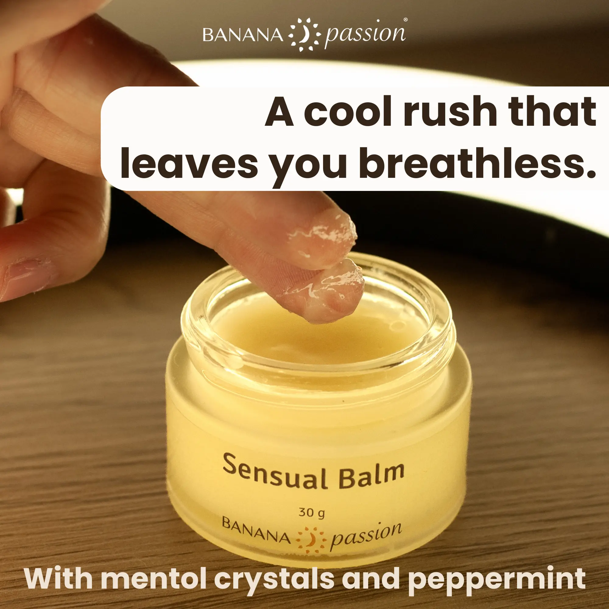 Orgasm balm that brings a cooling effect and leaves you breathless. Sensual tingle balm for orgasms in a clear jar, held between fingers above a table, used as a natural orgasm enhancer and stimulating balm for men and women—boost pleasure, intensify sensations, and enhance intimacy with this premium climax enhancement balm for sexual wellness and satisfaction. The tingle lip balm is a sex balm also known as tingle mint lip balm or nipple nibblers cool tingle balm