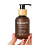 Banana Passion Relaxing Massage Oil—soft, soothing oil with sandalwood and musky wood scents, perfect for relaxing muscles, calming stress, body wellness, and couples’ massage rituals.