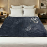 Waterproof intimacy blanket spread over a bed, soft fleece top with leakproof backing to keep sheets dry during spills and playful moments. This velvety waterproof blanket is the best intimacy blanket in Australia.