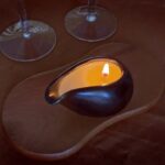 Melting the oil, pouring it on the skin, and gently massaging it into the skin