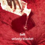 Water splashing and getting absorbed on a velvety blanket