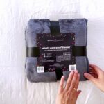 Showing the velvety flannel fleece and overall impression of this waterproof blanket