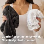 Comparison of a crinkly plastic pillow protector and a silent fleece one which are waterproof in nature